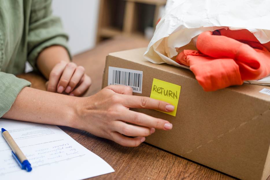 Cliente marca su paquete para devolución 